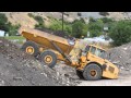 Volvo Dump Truck driving and dumping