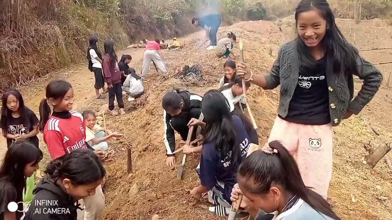 Children sowing ginger in the hostel garden 