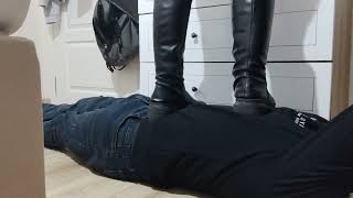 Black boots trample