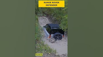 Range Rover Defender offroad in mud terrain