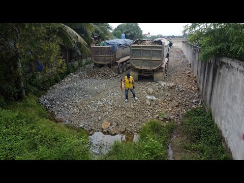 Nicely Landfill Complete Flood Block By Huge Shantui Dozer DH17C3 Pushing Stones with Dump Truck