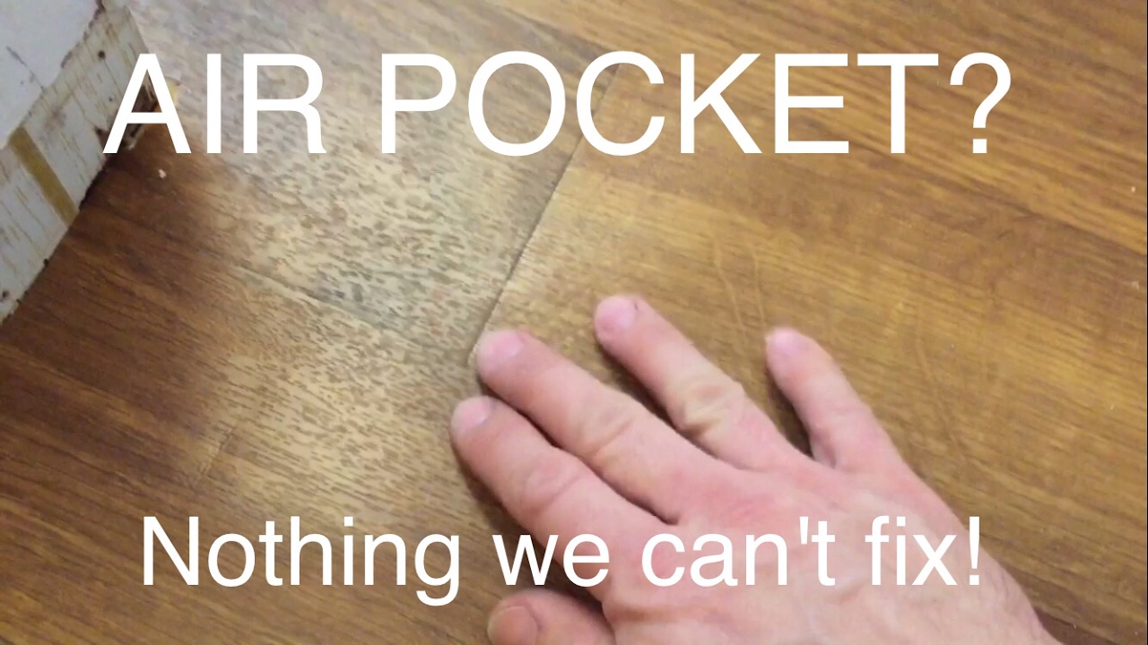 How to get rid of air pocket under vinyl linoleum - YouTube