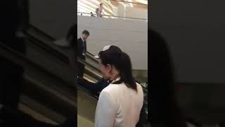 Kimi Räikkönen and girlfriend Minttu Virtanen followed by Fans at Shanghai Airport 2014