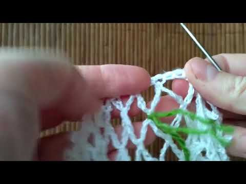 Beach dress crochet. Neckline trimmed with beads.