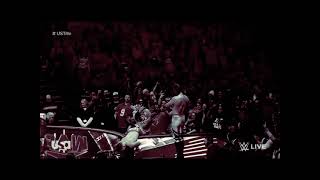 Seth Rollins - Barricade-Hung Diving Knee Drop From Announce Table