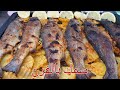 سمك بالفرن مع البطاطا و ورق العنب بتتبيله شهية 