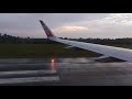 AirAsia A320N landing in wet and windy Bintulu