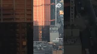 New York crane catches fire, partially collapses on Manhattan high rise