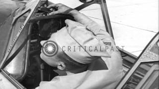 Aromere loads and mounts an A-N Gun Camera in US Curtiss P-40 and US Lockheed P-3...HD Stock Footage screenshot 5