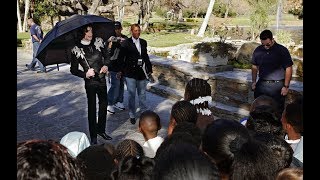 Michael Jackson hosts a party at Neverland for 200 underprivileged kids and their families 2004