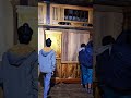 Late night wooden cabinet delivery in the mountains