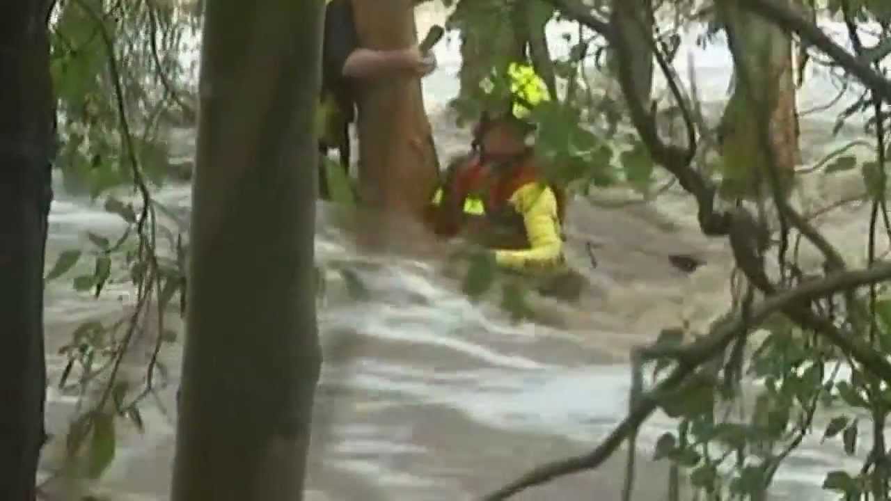 Dramatic rescue of boy swept away by raging flood water in Australia caught on video