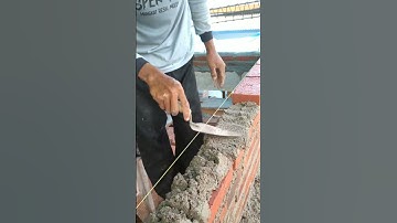 Building a Strong Brick Wall with Precision #constructiontips