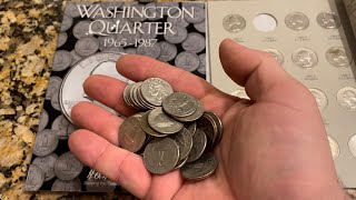Adding quarters to my Washington quarter album.