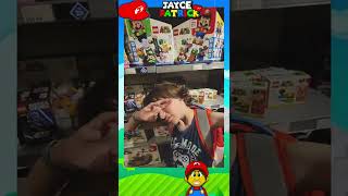 Jayce Dabbing in Front of Lego Mario, Peach, &amp; Luigi at Lego Store