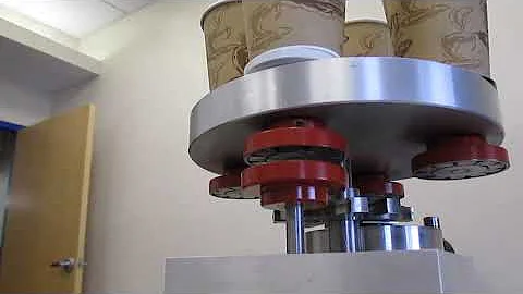 ROTARY INDEXING TABLE WITH MAGNETIC DISC COUPLING