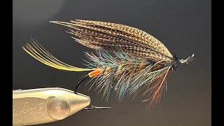 Live fly tying, tying the classic salmon fly Rogans Fiery Brown with Jonas Andersson