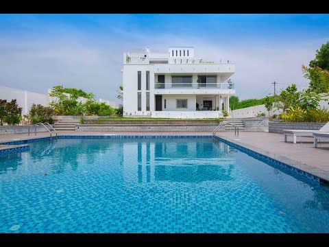 Contemporary pool facing house by Padma & Prabhakar designs. | Architecture & Interior Shoots |