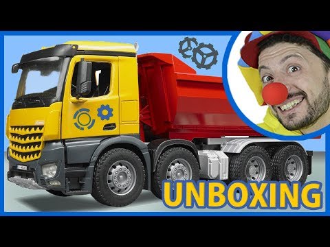 Clown Bob unboxing Construction Vehicles Dump Truck toy