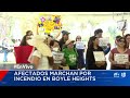 Afectados por incendio en Boyle Heights marchan y exigen respuestas
