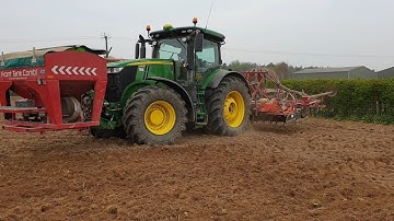 John Deere 320HP Tractor.  Power harrow/drill combo