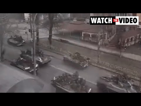 Russian military vehicles move through Kherson, Ukraine