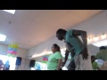 Mo Diakite dancing cumbia with Yessenia