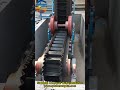 sidewal conveyor belt installation