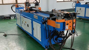 Automatic pipe bending machine with hole punching function