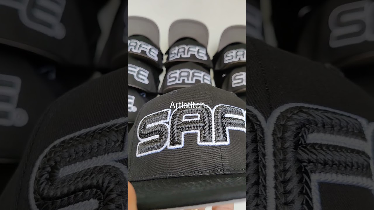 multi - layer textured 3d puff embroidery on a custom cap with sublimation print dome lining.