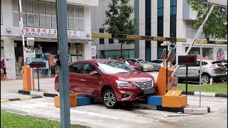 5Jan2019 Driver Took Down Carpark Gantry And Got Stuck On The Kerb