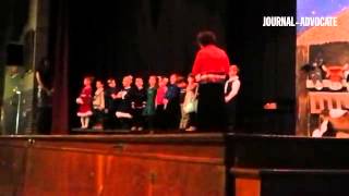 Saint Anthony Catholic School preschoolers perform Silent Night at the school's Christmas program.