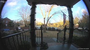 UPS driver fixes American flag after heavy rain