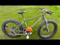 Motorize your bicycle  build a motorized bike using grass cutting machine  homemade trimmer bike