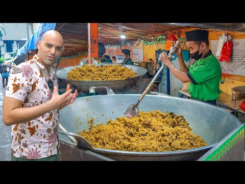 Video: Si të hani Nasi Goreng, oriz të skuqur të Indonezisë