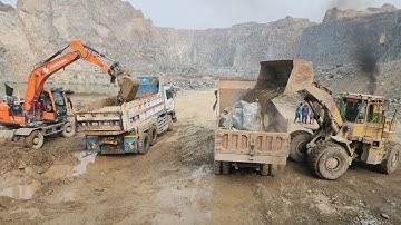 Caterpillar 966D Wheel Loader Vs Daewoo Excavator: Loading Rock & Quarry into Big Dump Trucks