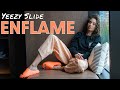 enflame yeezy slides on feet