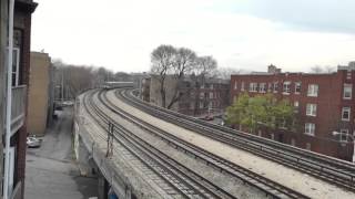 CTA Redline train passes and stops by apartment near Loyola station