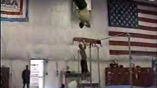 鉄棒　The Crockett, a double twisting jaeger on the High bar