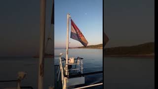Croatia National Flag flying on Ferry to Dubrovnik