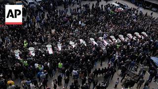 Funeral held for 13 Lebanese officers killed in Israeli strike in Lebanon