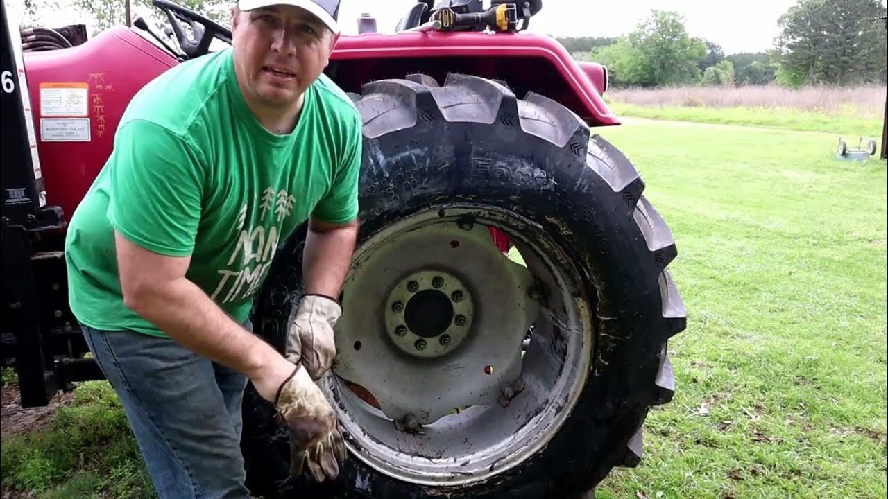 Installing Changing Tractor Tires With a Backhoe YouTube