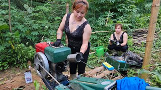 Mechanic girl fixes a tractor that won