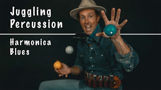 Video thumbnail of "Blues Harmonica with Juggling Percussion - Juzzie Smith"