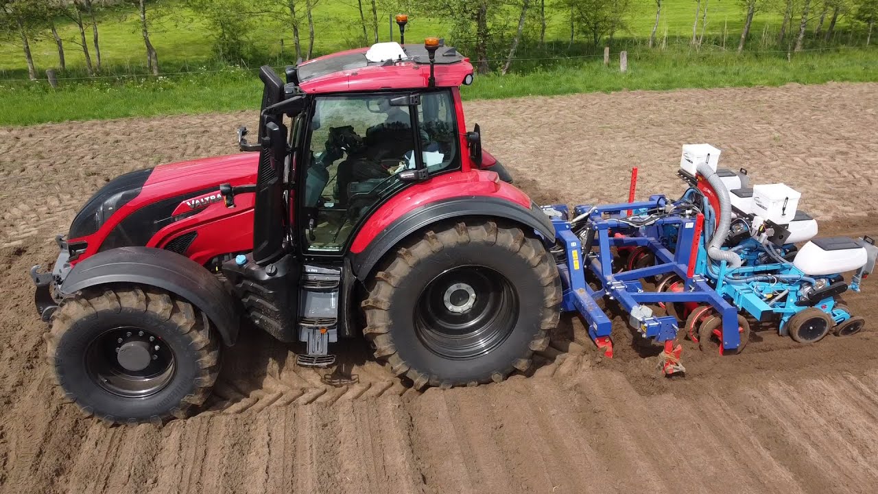Holvo Holvo drilling corn on ridges - YouTube