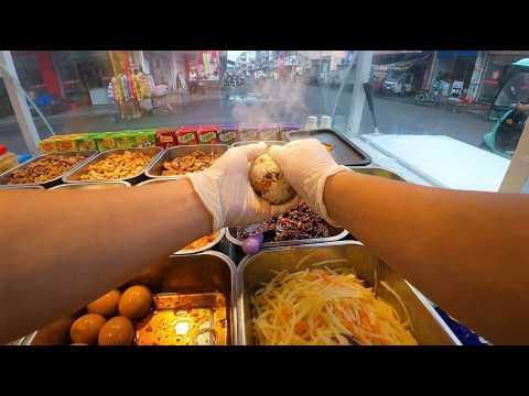 Crafting Traditional Chinese Sticky Rice Rolls at a Street Stall
