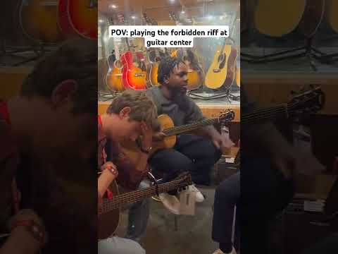 Playing forbidden riff.