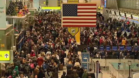 'It's really hard': Thousands of travelers stranded after more than 2K flight cancelations