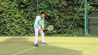 Sharapova and Djokovic on court with Golden HEAD Ball winners