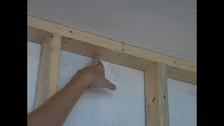 how to attach a newly framed wall to the ceiling